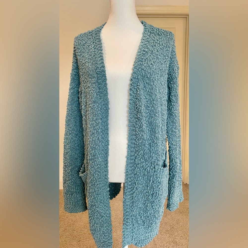 Listicle Long-sleeve, Popcorn knit, pale green cardigan.